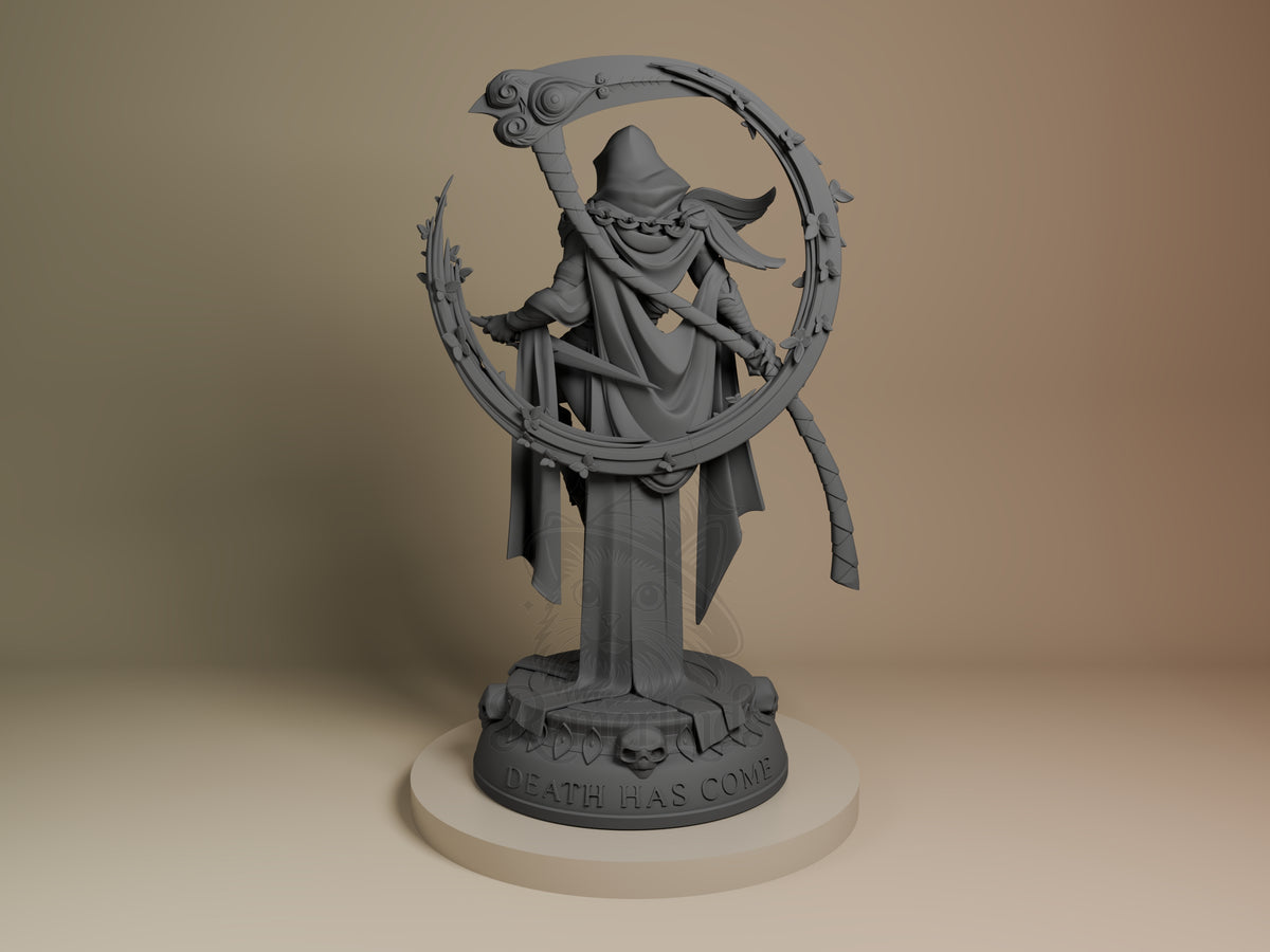 Thanatos resin figure from Hades with scythe held aloft, wearing pointed hat and flowing robes, unpainted gray finish on wooden base.