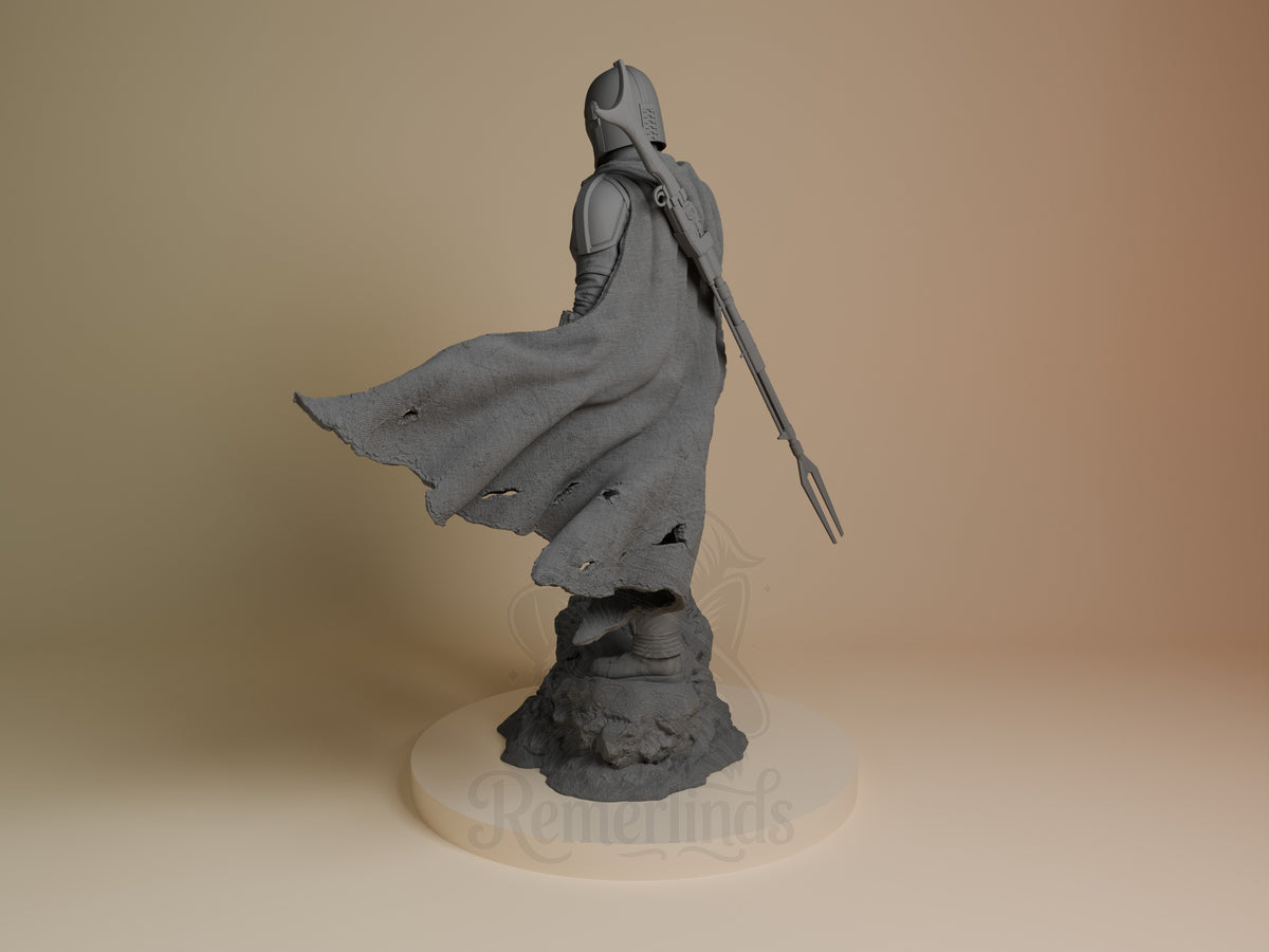 The Mandalorian from Outer Rim Hunter is an unpainted resin figure viewed from behind with a cape, weapon, and rocky base.