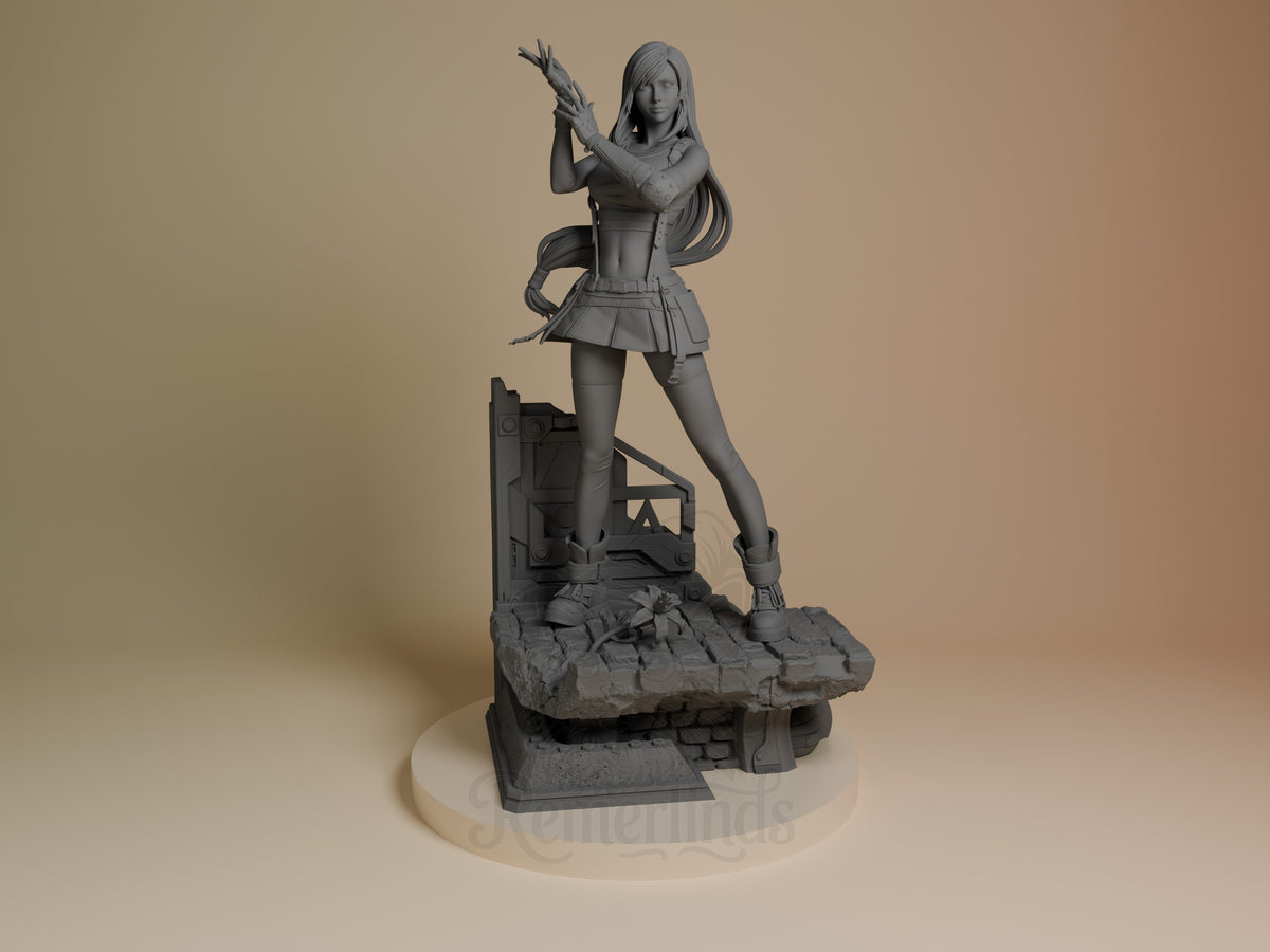 Tifa Lockhart resin figure from Final Fantasy, unpainted gray, posed standing on rocky base holding feathered staff, front view.
