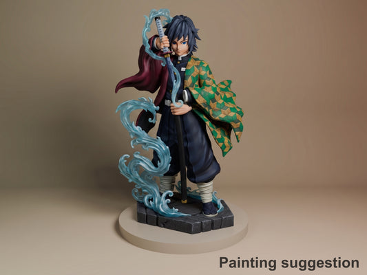 Tomioka resin figure from Demon Slayer in dynamic pose with blue water effects, green haori, sword raised, on dark base with painting suggestion label.