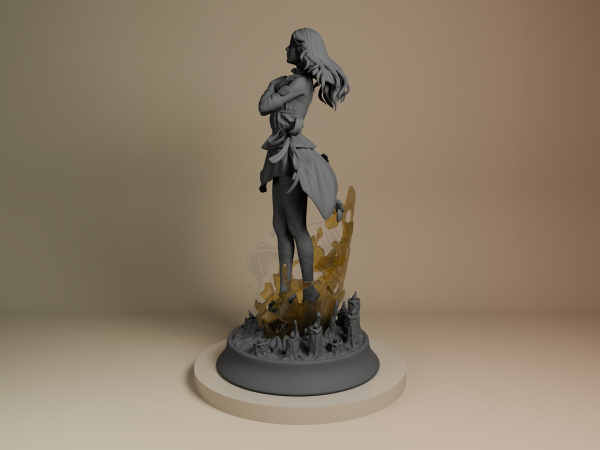 Tomorrow from Death Stranding resin figure in side profile, standing on rocky base with gold accent, unpainted gray finish, flowing hair and coat details visible.
