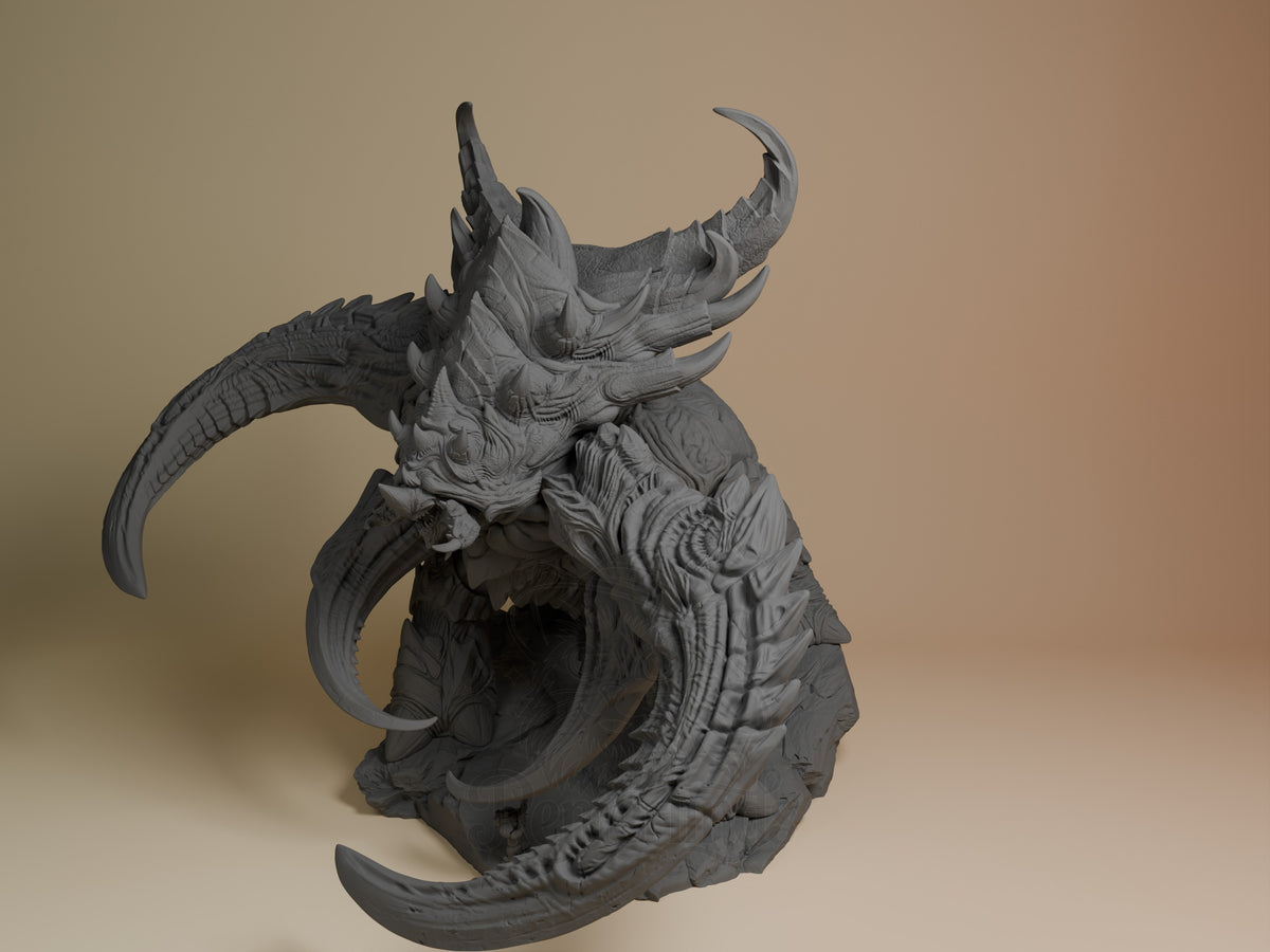 Ultralisk resin figure from StarCraft II shown at angle, displaying detailed carapace, curved horns, and clawed limbs against neutral background.