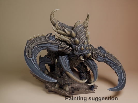 Painted Ultralisk resin figure from StarCraft II shown at three-quarter angle with extended claws and horns on rocky base, demonstrating color scheme suggestion.