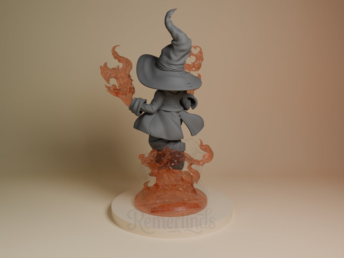 Vivi Ornitier resin figure from Final Fantasy, unpainted gray with painted orange flame effects, wearing iconic hat and coat, standing on decorative base.
