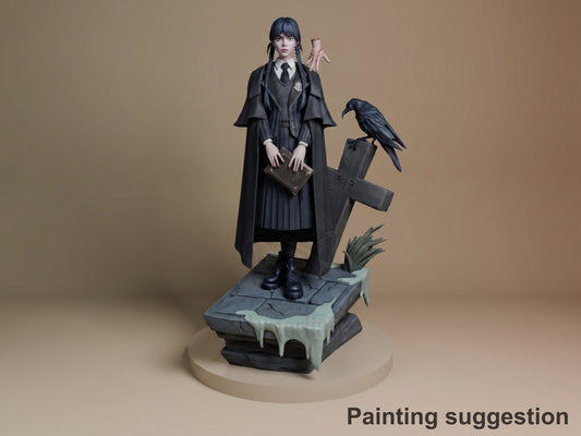 Wednesday Addams resin figure in school uniform on gothic base with raven, painted in black and gray tones, front three-quarter view.
