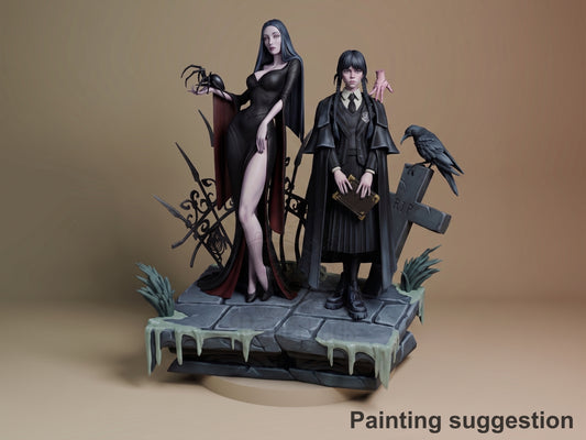 Wednesday and Morticia Addams painted resin diorama on gothic stone base with crow and tombstone, posed against tan backdrop.
