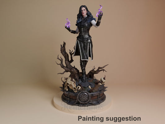 Yennefer from The Witcher resin figure painted in black outfit with purple magic effects, standing on dark gothic base with skull details and magical circle emblem.