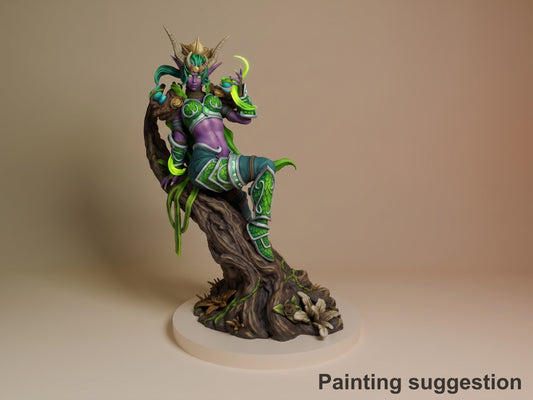 Ysera dragon resin figure painted in vibrant greens and purples, posed rearing on wood-textured base, front three-quarter view.