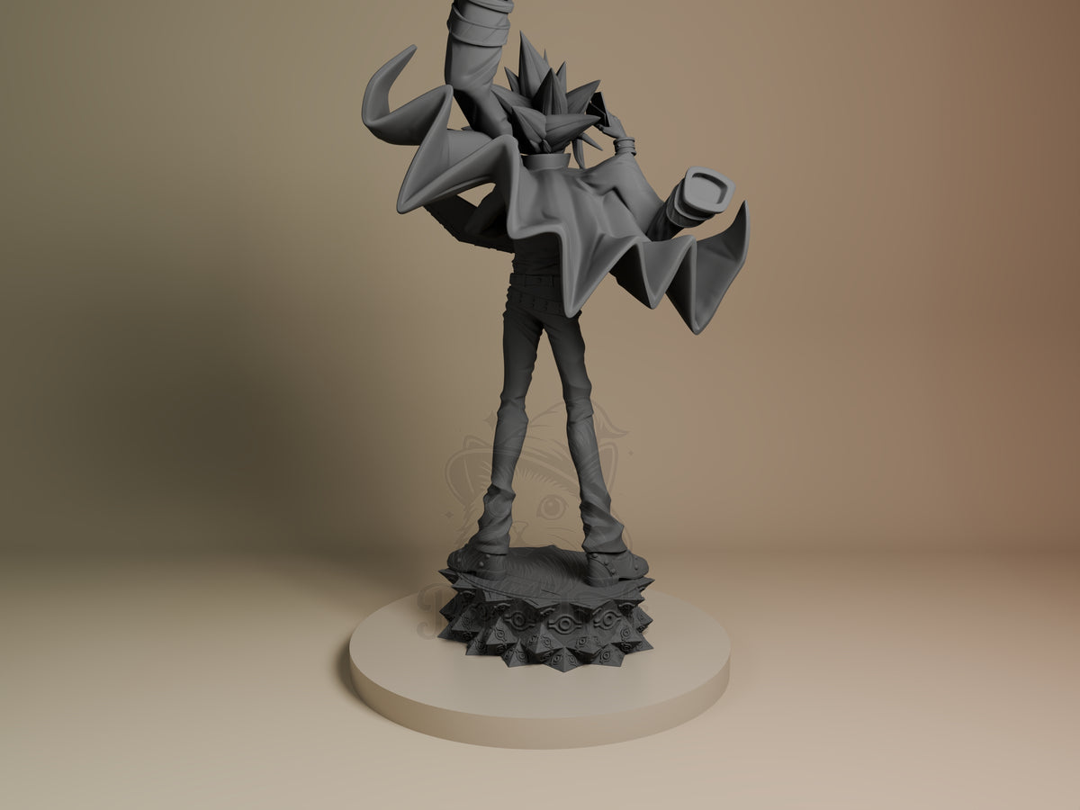 Unpainted back view of Yugi from Yu-Gi-Oh!, a resin figure with cape on a sculpted base.