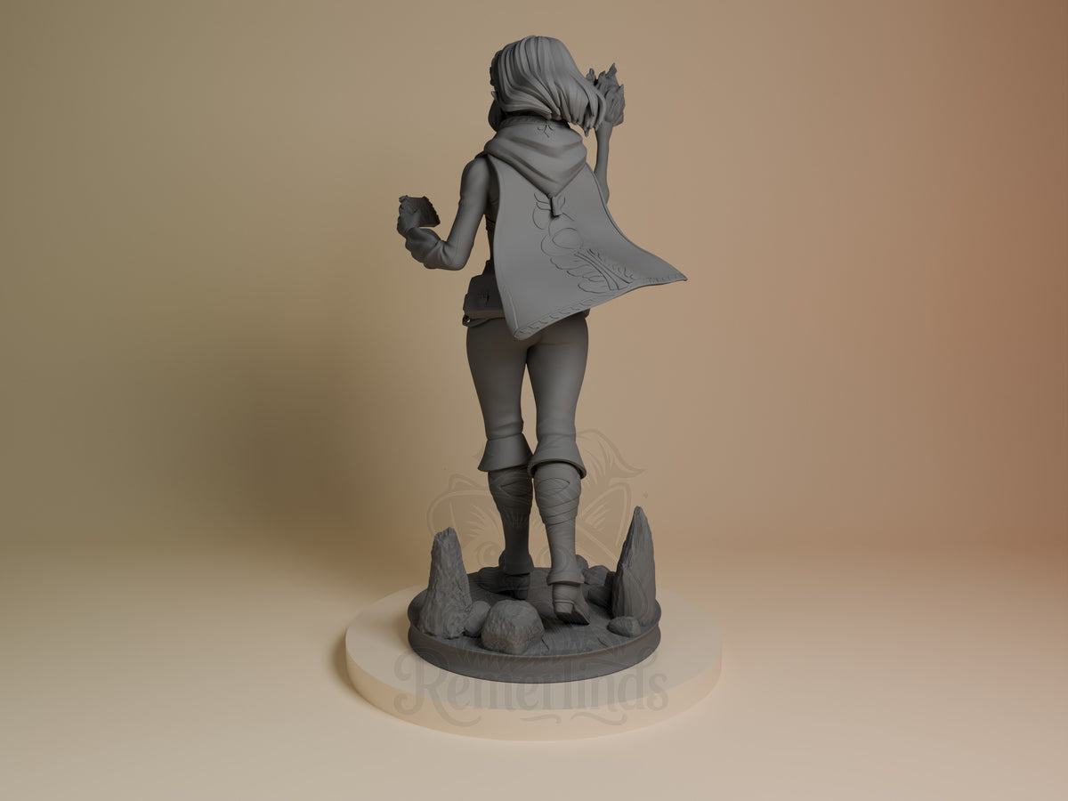 Princess Zalde resin figure shown from behind, standing on rocky base with cape flowing, unpainted gray finish, left side view.