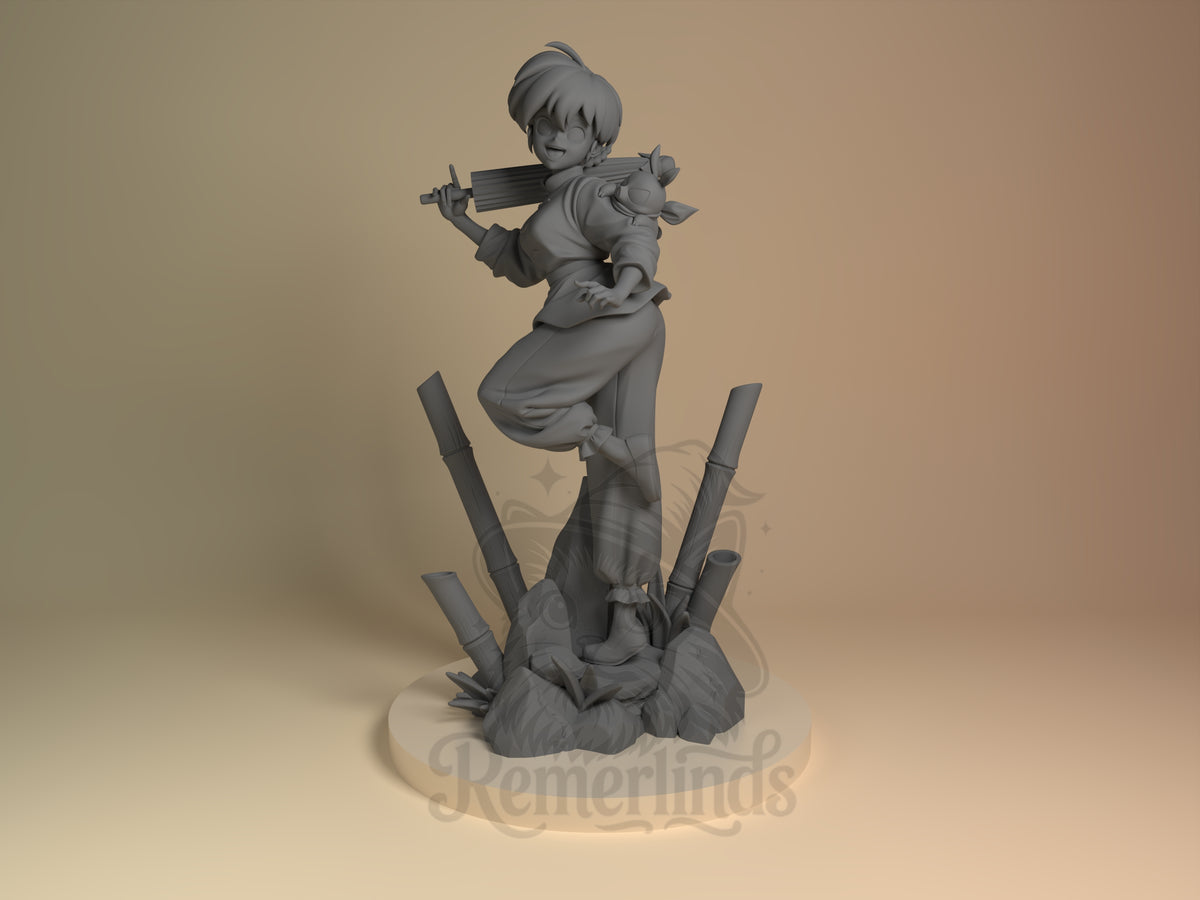 Ramma Half-and-Half Dojo 3D printed resin figure by Nomnom, unpainted front view. This 3D printed resin figure depicts Ranma from Ranma 1-2 in a lively martial arts pose. Ranma is balanced on one foot atop a rocky base surrounded by bamboo stalks, gripping a wooden practice sword slung over one shoulder. The sculpt captures the character's energetic spirit and dojo theme with detailed clothing and a confident expression.
