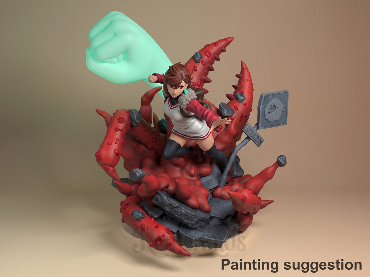 Painted Momo Ayase resin figure from Dandadan in a dynamic pose on a sculpted rocky base.