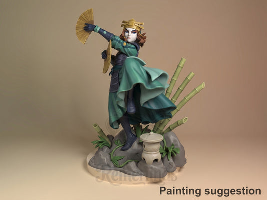 Painted Siku resin figure from Avatar: The Last Airbender poses with a fan on a bamboo base.