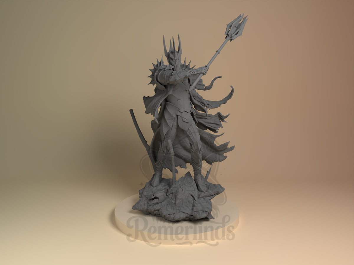 Sauron Legendary Ring Saga 3D printed resin figure by Nomnom, unpainted front view. This 3D printed resin miniature figure depicts Sauron from Lord of the Rings standing authoritatively on a rocky base. The figure grips a large spiked mace held diagonally, with heavily detailed spiked armor and a tattered cape creating a dynamic flowing effect. The angular and spiked elements emphasize the menacing and powerful presence of the character, capturing the iconic dark lord in a dramatic pose.